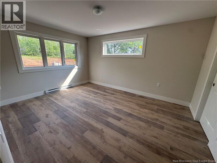 Property Photo:  268 Main Street Unit# 104  NB E5N 6B8 