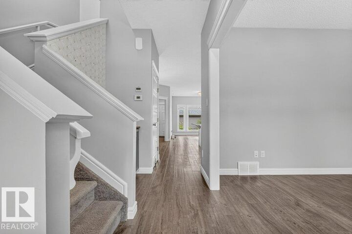 Property Photo:  1064 Cy Becker Road NW  AB T5Z 0J1 