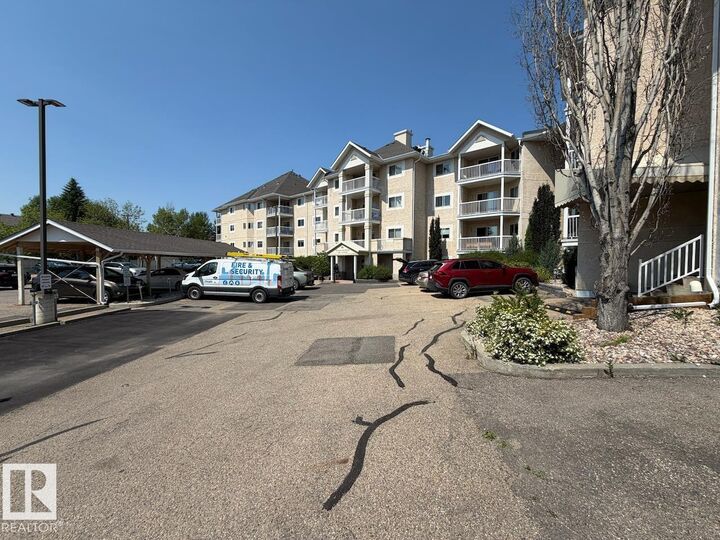 Property Photo:  11620 9A Avenue NW 312  AB T6J 7B4 