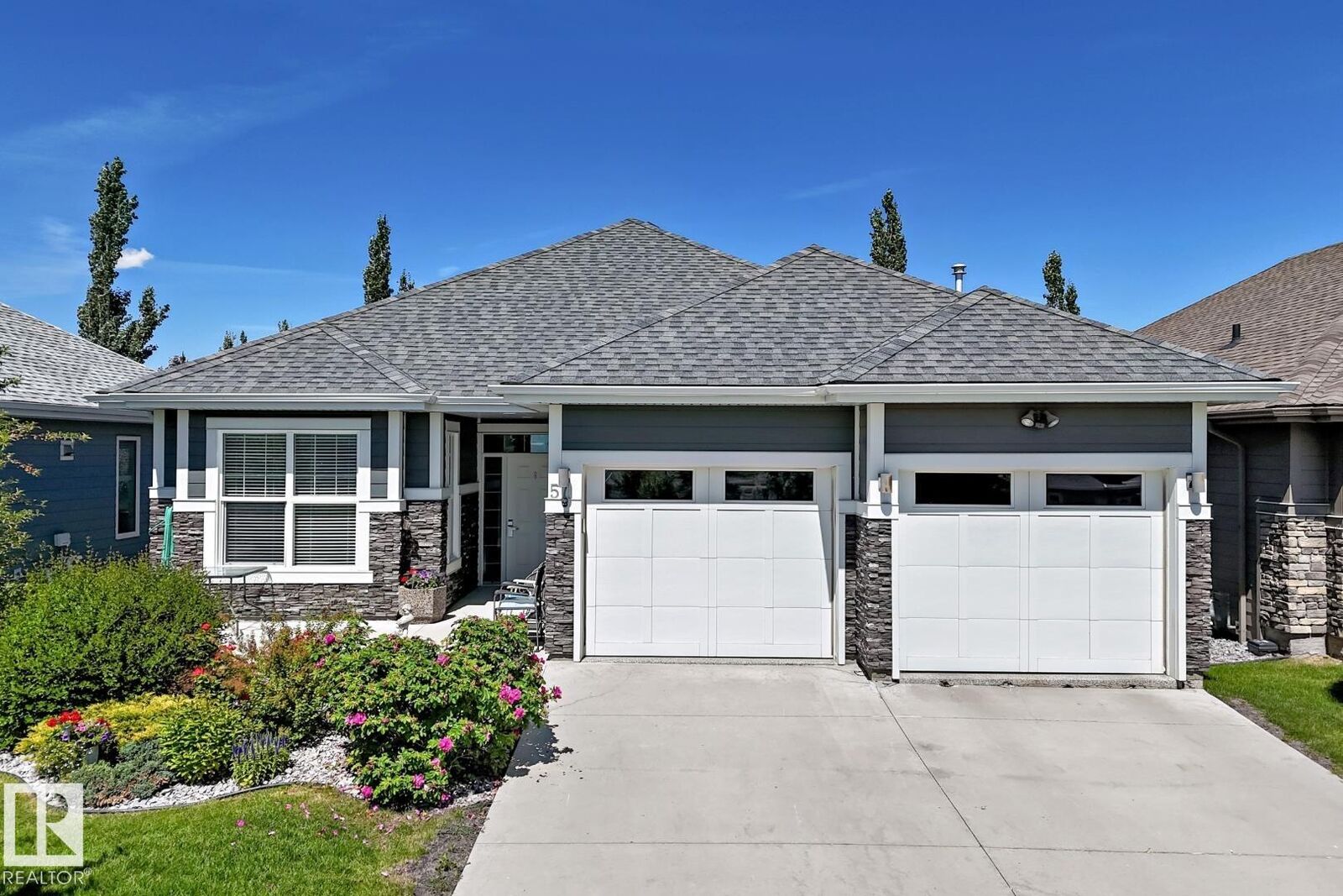 Property Photo: 18343 Lessard Road NW 57 AB T6A 0A2