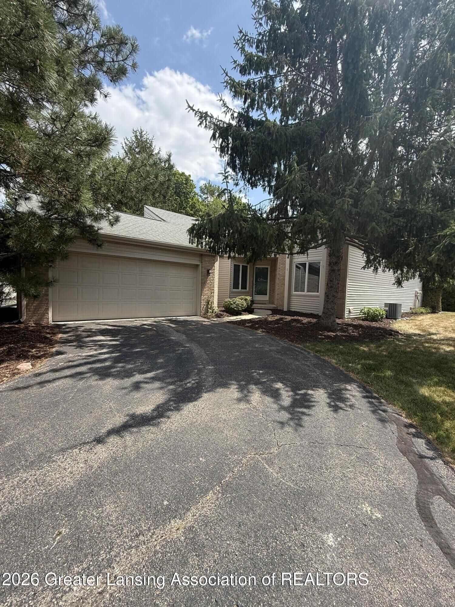 Property Photo:  7103 Treasure Isle  MI 48917 