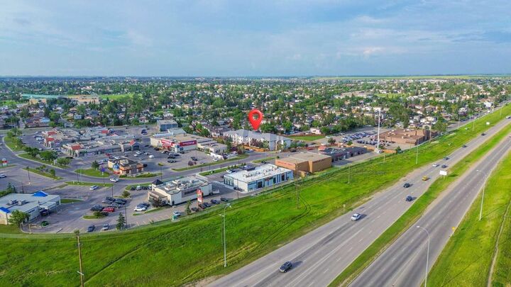 Property Photo: 5555 Falsbridge Drive NE 103 AB T3J 3E8