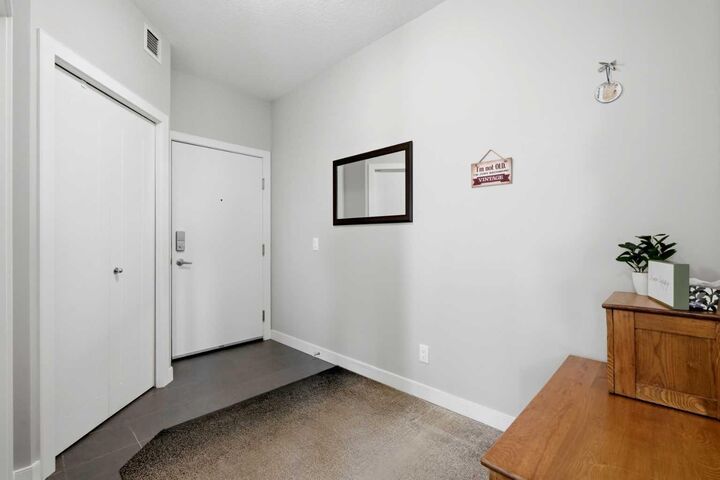 Property Photo:  604 East Lake Boulevard NE 2201  AB T4A 0G6 
