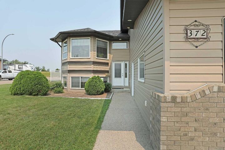 Property Photo: 372 Lake Stafford Drive E AB T1R 1P8