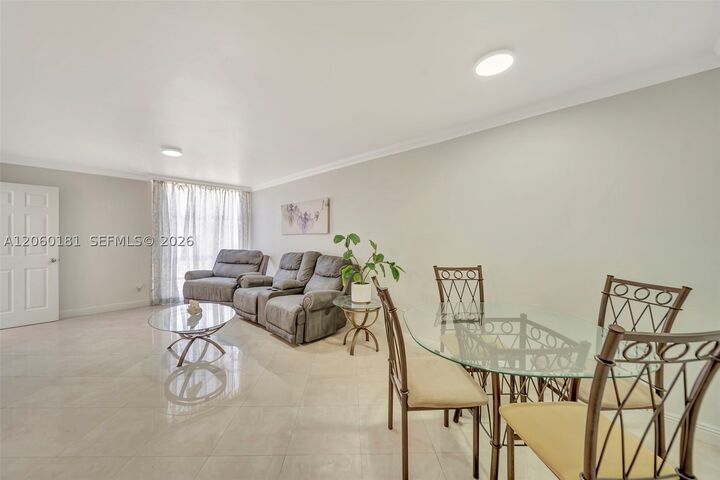 Property Photo:  200 172nd St 220  FL 33160 