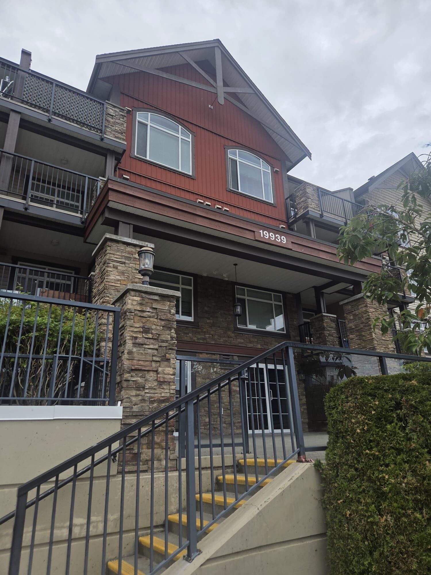 Property Photo: 19939 55A Avenue 409 BC V3A 3X4