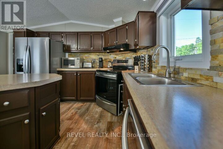 Property Photo:  126 Remi Crescent  ON P4N 0C4 