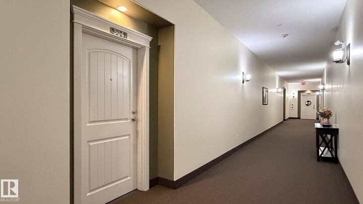 Property Photo: 511 Queen Street 304 AB T7X 0G4
