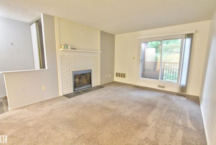 Property Photo:  47 Akins Drive 302  AB T8N 3M6 