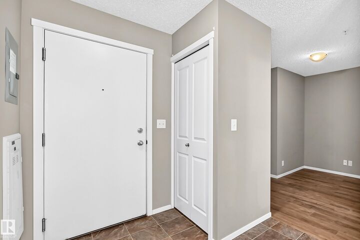 Property Photo:  5816 Mullen Place NW 219  AB T6W 0W3 