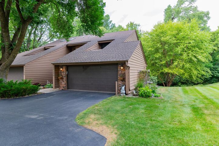 Property Photo:  11170 36th Place N  MN 55441 