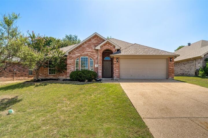 Property Photo: 223 Carriage Drive TX 76087