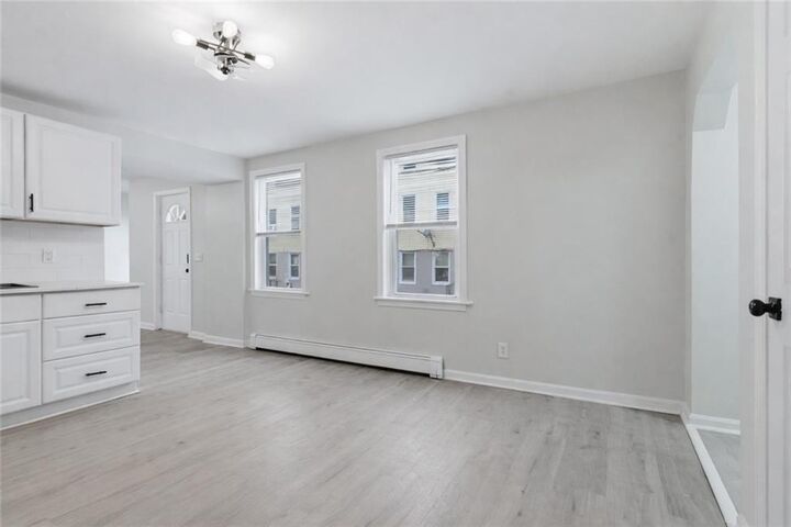 Property Photo:  92 Sylvian Street 1  RI 02863 