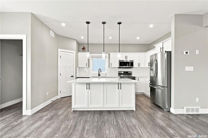 Property Photo: 247 Thakur Street SK S7W 1C5