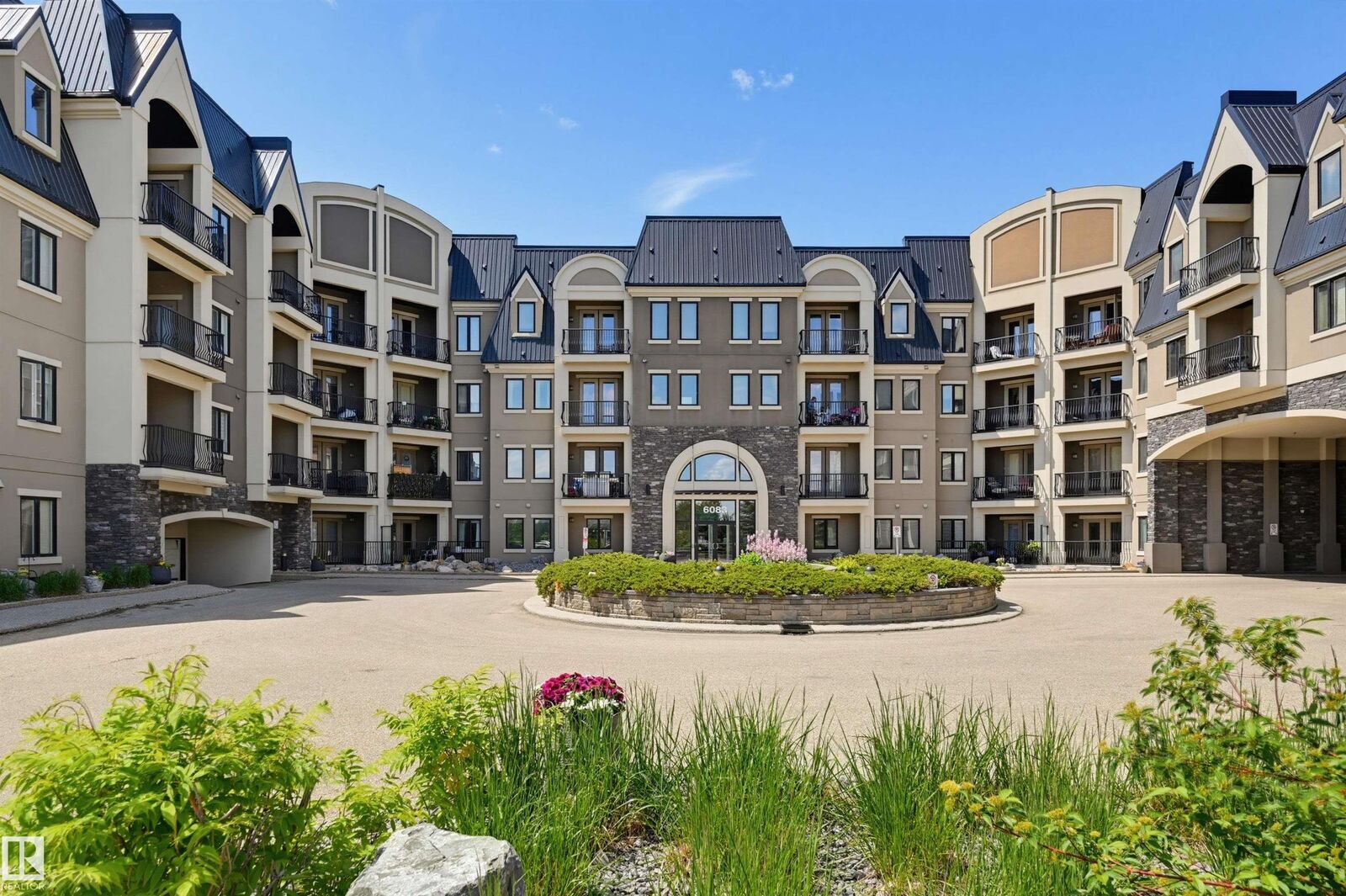 Property Photo: 6083 Maynard Way NW 110 AB T6R 0S5