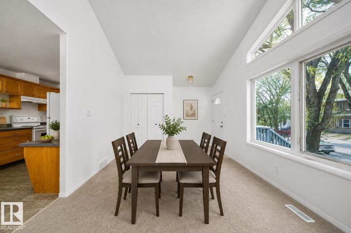 Property Photo:  12041/43 67 St NW NW  AB T5B 1M4 