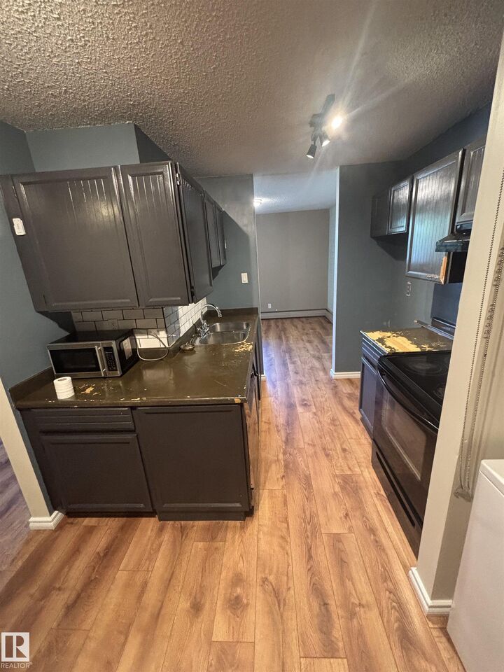 Property Photo:  2311 119 Street NW 206  AB T6J 4E2 
