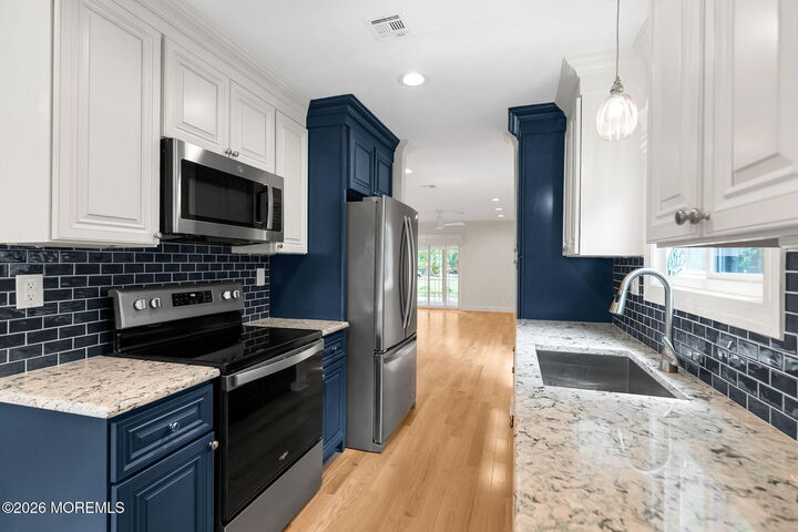 Property Photo:  10 Medford Court  NJ 07701 
