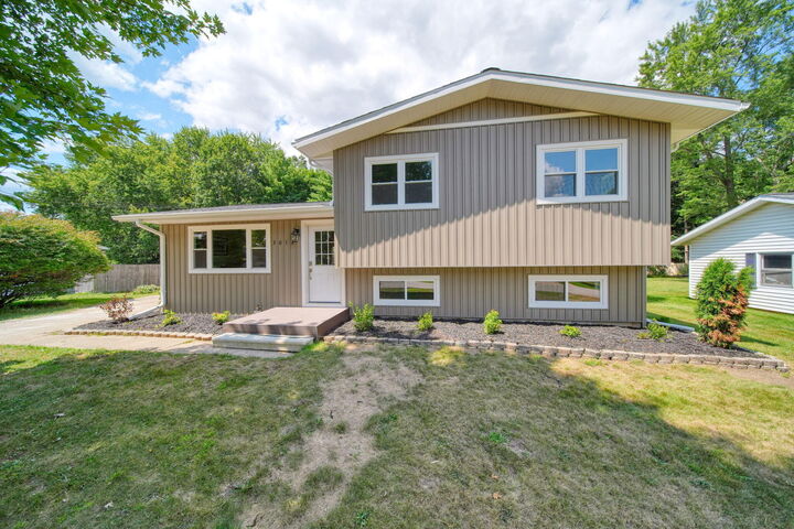 Property Photo:  3012 John Glenn Drive  MI 49201 
