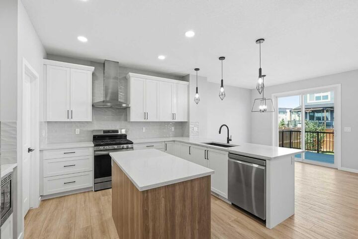 Property Photo: 118 Magnolia Terrace SE AB T3M 3G7
