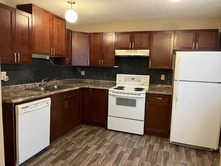 Property Photo: 179 Falshire Drive NE AB T3J 1P7