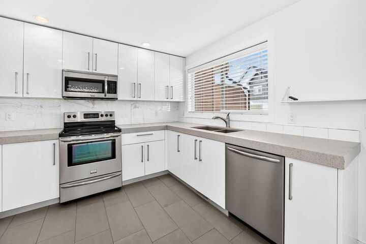 Property Photo: 1530 Bayside Avenue 1803 AB T4B 4B5