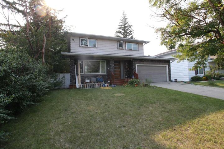 Property Photo: 7331 Keewatin Street SW AB T2V 2M6
