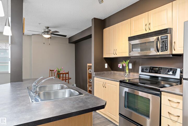 Property Photo: 11445 Ellerslie Rd SW 111 AB T6W 1T1