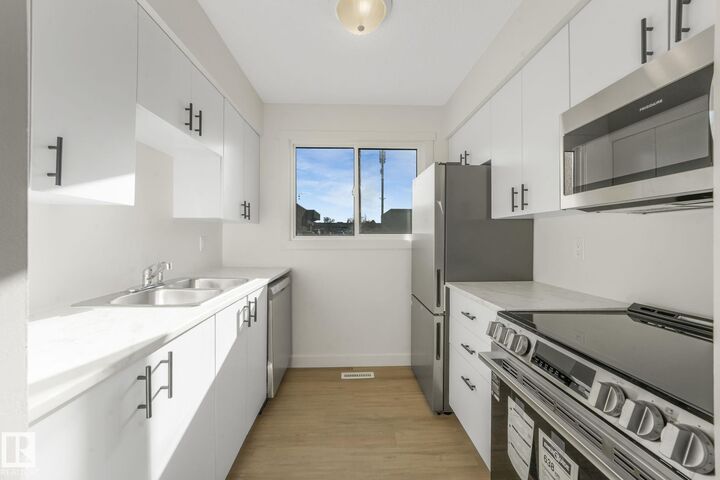 Property Photo:  5833 Riverbend Road NW  AB T6H 5A8 
