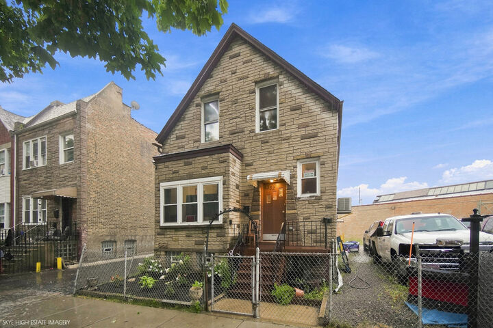 Property Photo:  1332 N Harding Avenue  IL 60651 