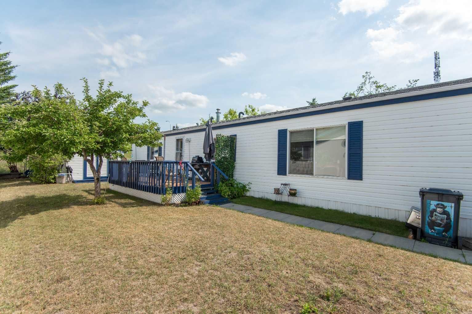 Property Photo: 37543 England Way 337 AB T4S 2C3