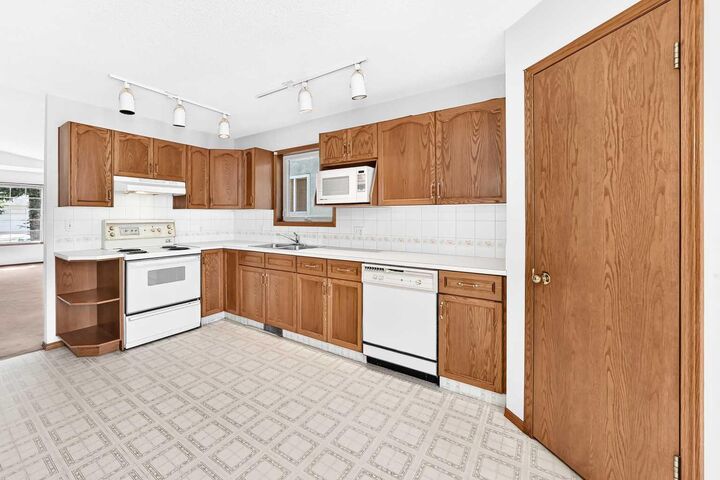 Property Photo: 396 Hawkstone Drive NW AB T3G 3T7