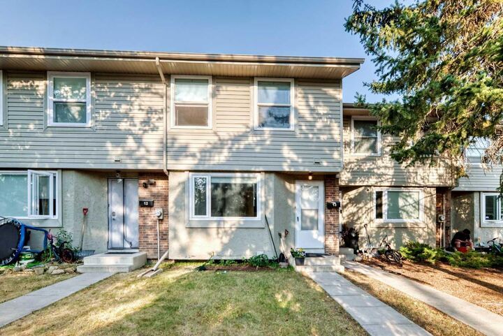 Property Photo: 123 Queensland Drive SE 13 AB T2J 3R3