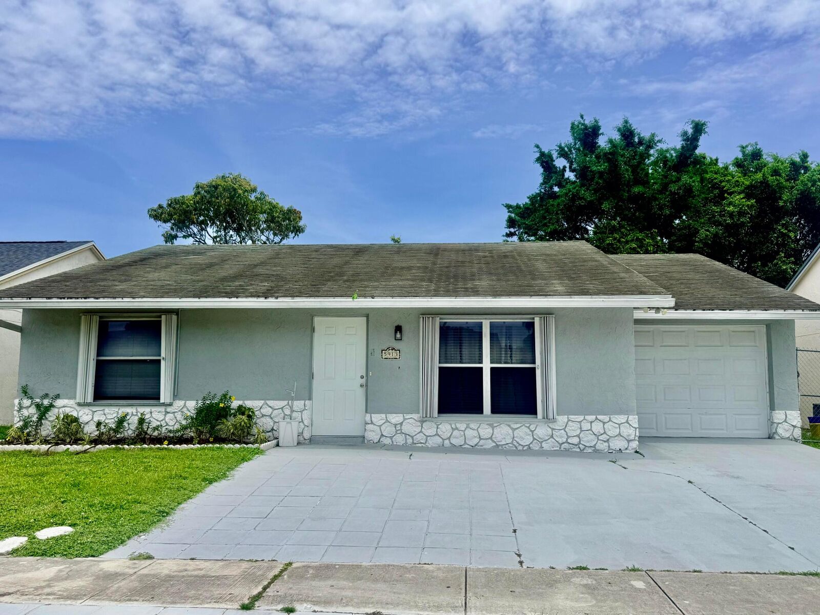 Property Photo:  5913 Corson Place  FL 33463 