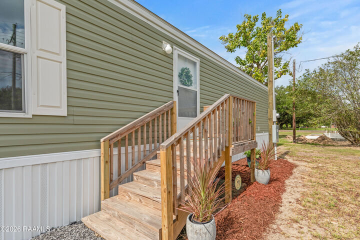 Property Photo:  1204 Dermelie Calais Road  LA 70517 