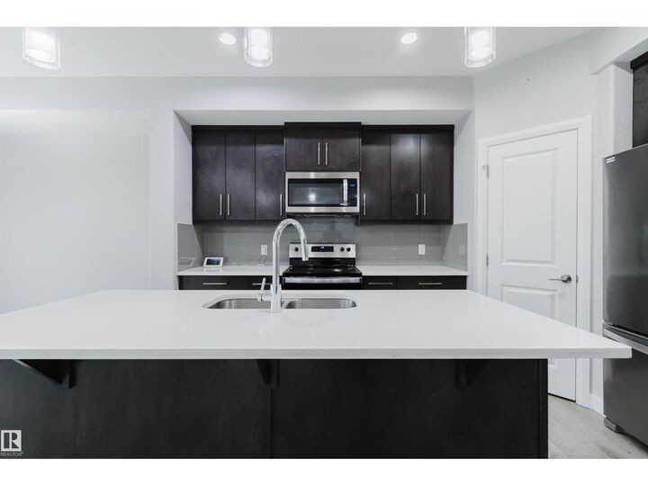 Property Photo:  6345 Cartmell Rd SW  AB T6W 4A3 