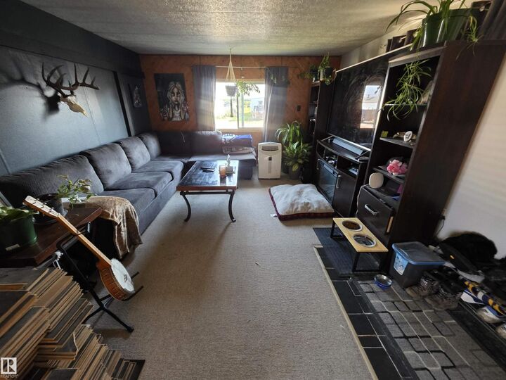 Property Photo:  #242 49301 RR 80  AB T7A 1L7 