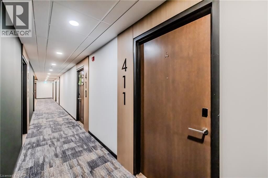 Property Photo:  101 Golden Eagle Road 411  ON N2V 1C3 