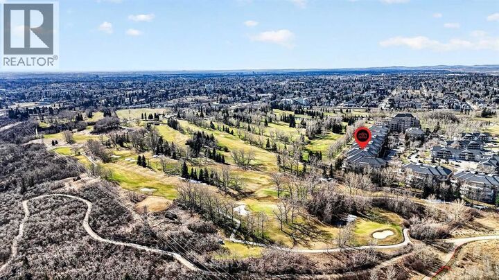 Property Photo: 14 Hemlock Crescent Southwest AB T3C 2Z1