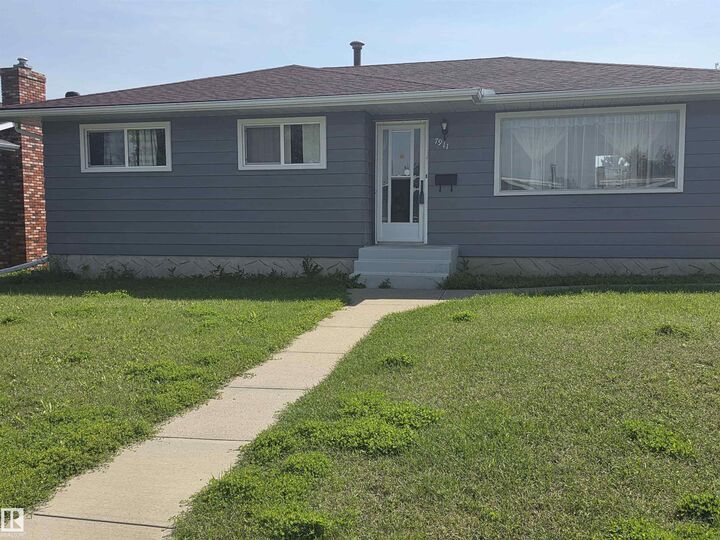 Property Photo: 7911 145 Avenue NW AB T5C 2S8