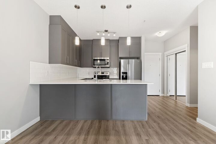 Property Photo: 812 Welsh Drive SW 121 AB T6X 1Y7