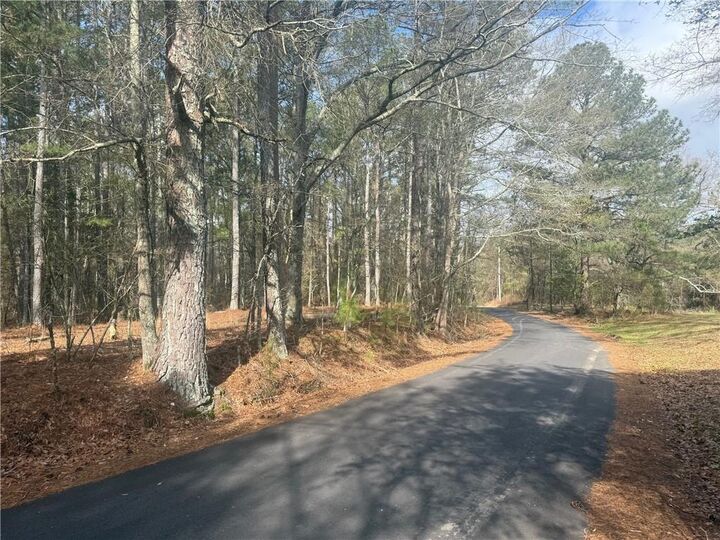 Property Photo:  8615 Smith James Road  GA 30039 