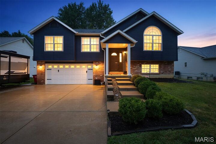Property Photo:  104 Williamsburg Drive  MO 63019 