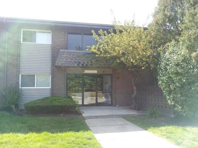 Property Photo: 4518 Beau Monde Drive 203 IL 60532