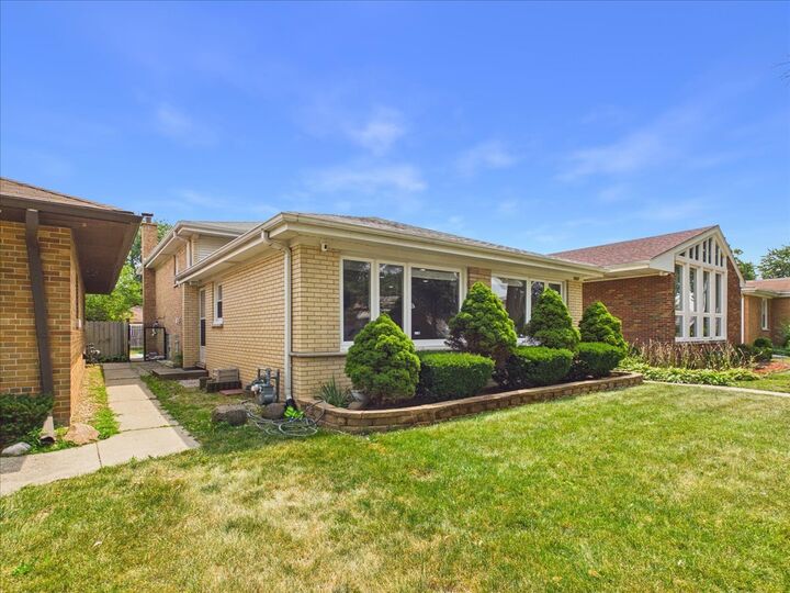 Property Photo:  7427 Keeler Avenue  IL 60076 