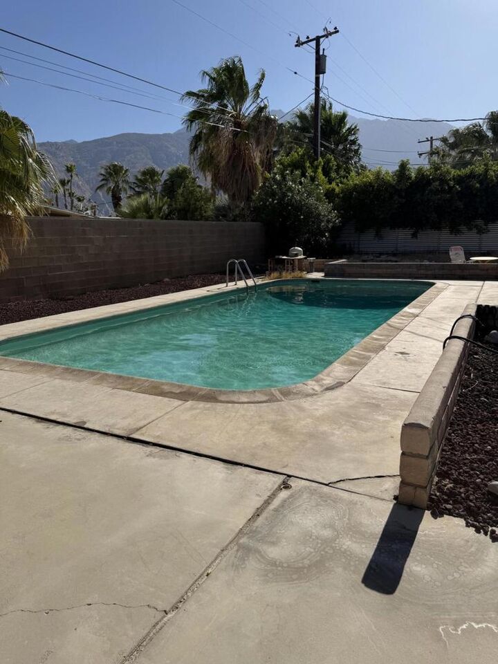 Property Photo:  897 E Racquet Club Road  CA 92262 