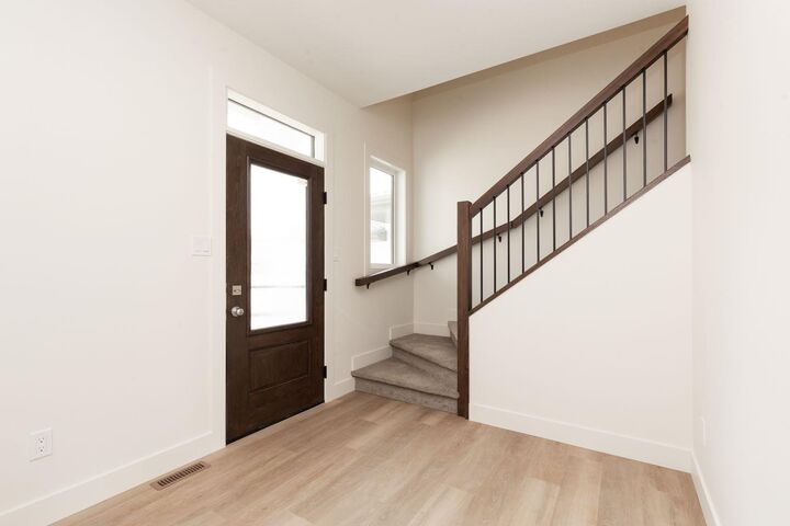 Property Photo: 558 Malahat Green W AB T1J 5H1