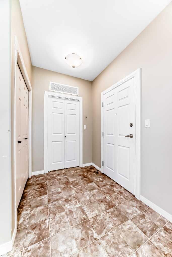Property Photo: 69 Ironstone Drive 206 AB T4R 0J8
