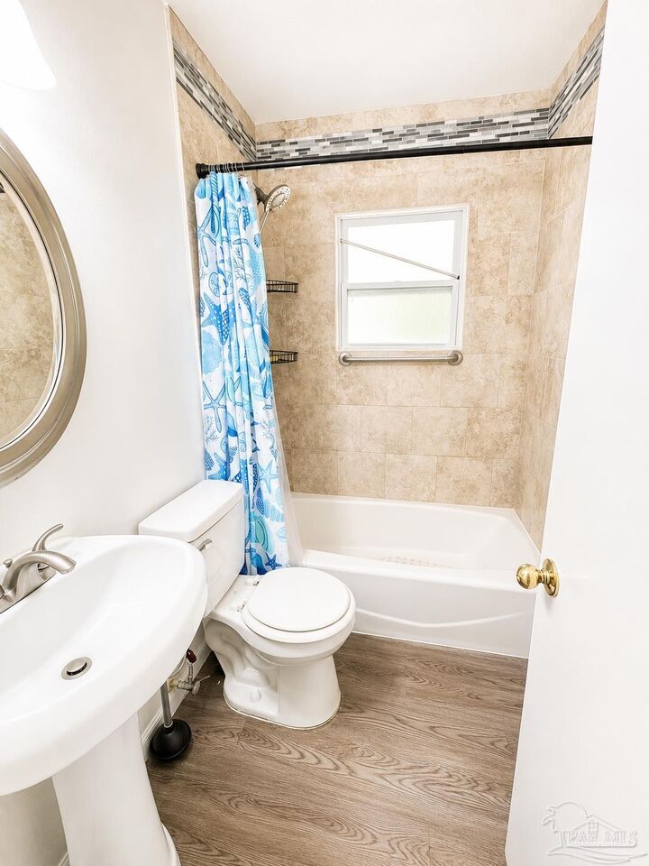 Property Photo:  5778 Avondale Rd  FL 32526 