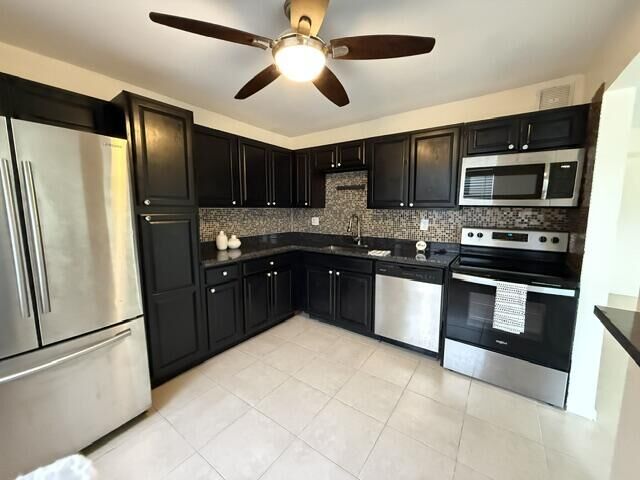 Property Photo:  122 Piedmont C  FL 33484 